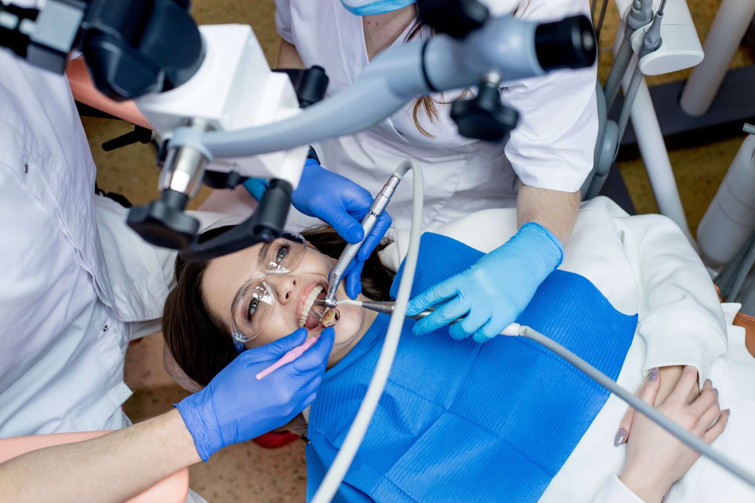 Dentist treating a cavity in a patient's tooth
