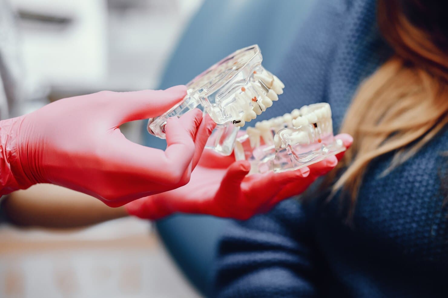 Patient consulting a dental implant specialist in London