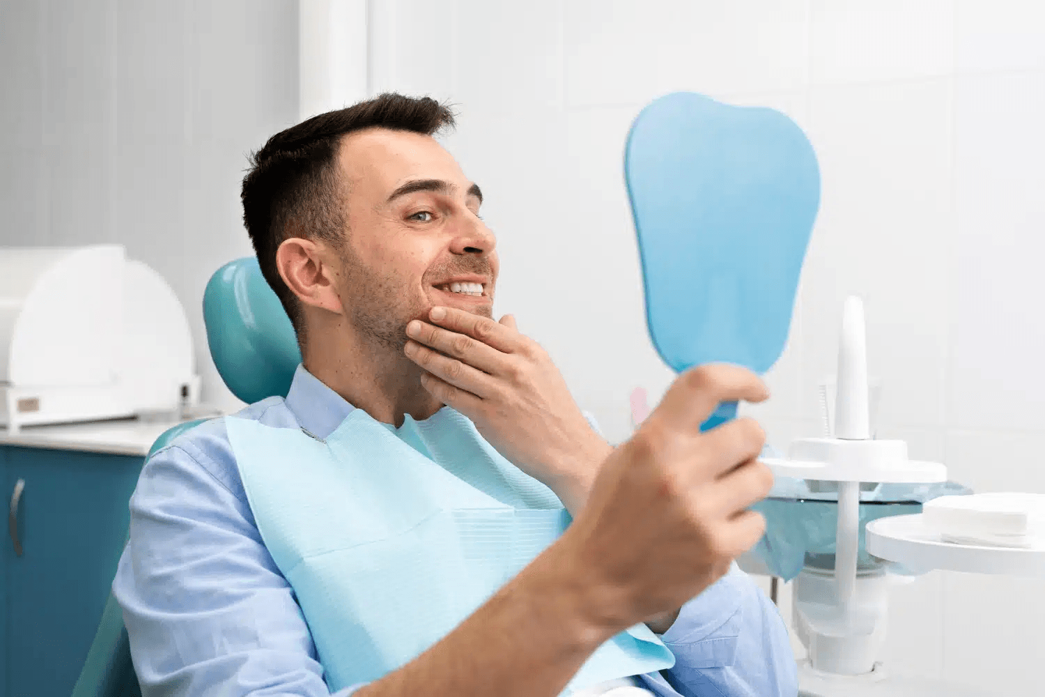 Dentist consulting patient about implant treatment options