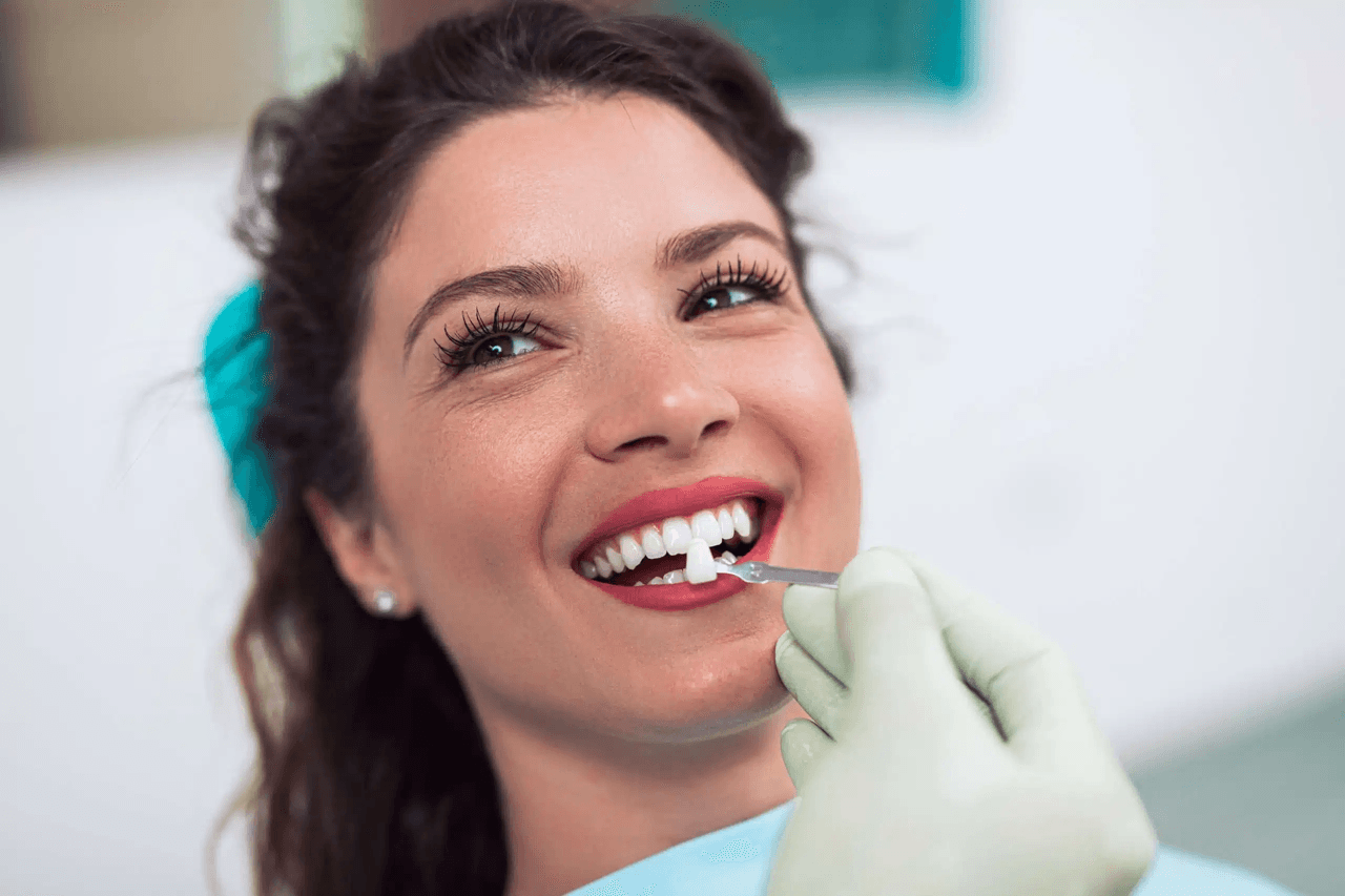 Dentist examining a patient's front teeth