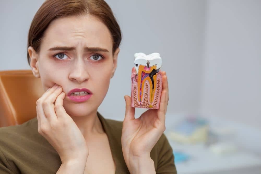 Dentist performing a tooth filling procedure