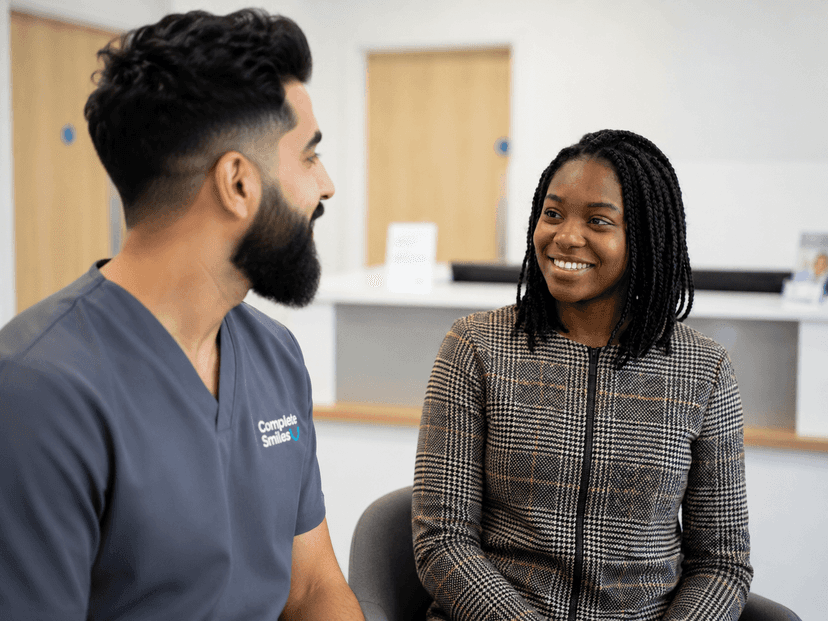 Clinician speaking with a patient